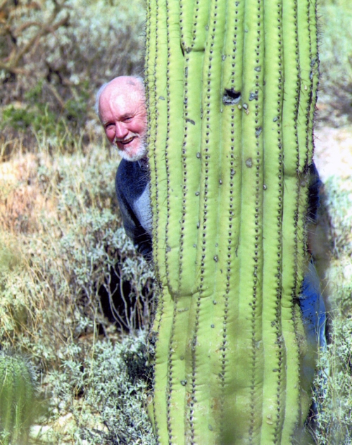 In this undated photo, Jack shows his playful side by hiding behind a sauguaro cactus.